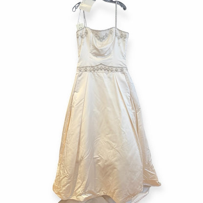 Stunning Cream Bridal Gown with Beaded Accents